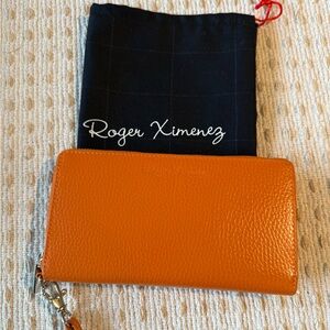 New Roger Ximenez leather clutch wallet. Orange